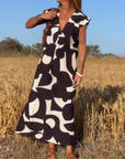SITA - Dress with Print and V-Neckline