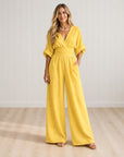 TESSA - Elegant Wrap Jumpsuit with Wide Leg and Pockets - Bright Yellow