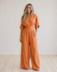TESSA - Elegant Wrap Jumpsuit with Wide Leg and Pockets - Orange