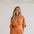 tessie-elegant-wrap-jumpsuit-with-wide-leg-and-pockets-orange